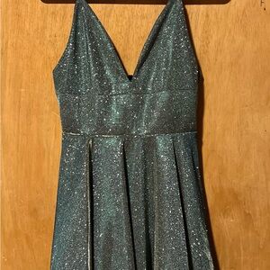 Prom style dress to use maybe in a graduation never worn.